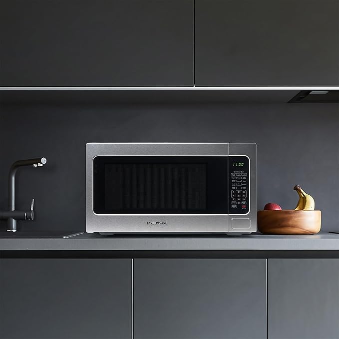 Farberware 2.2 Cu. Ft. Countertop Microwave Oven – 1100 Watts Power, Smart Sensor Auto Cook Settings, Defrost, Easy Clean and Child Safety Lock - Stainless