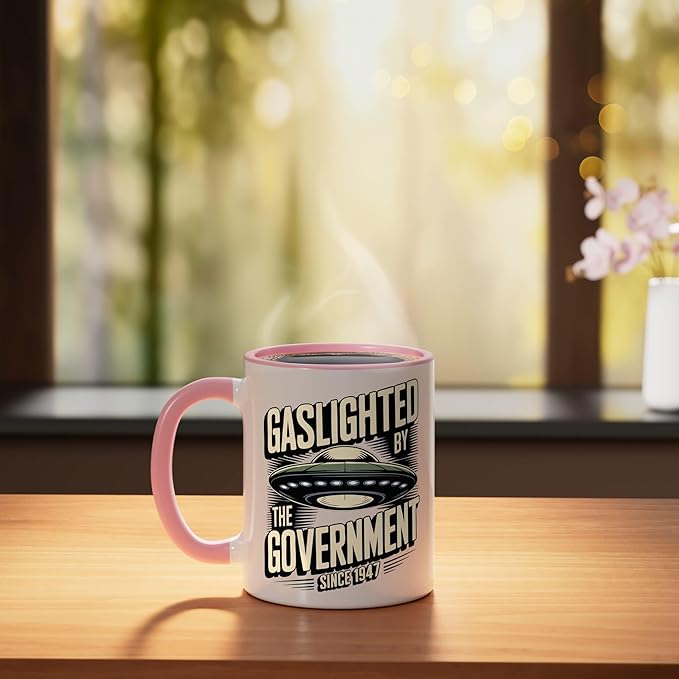 Alien UFO Gaslighted by the Government 1947 Ceramic Mug, Pink/White