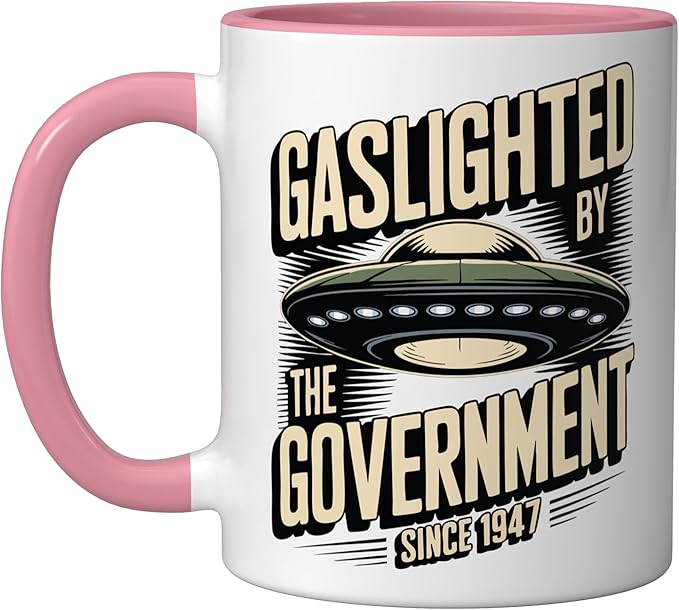 Alien UFO Gaslighted by the Government 1947 Ceramic Mug, Pink/White