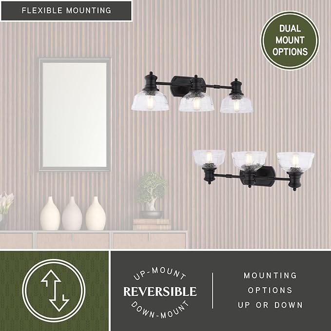 VAXCEL Beloit 3-Light 25.5 in. Wide Matte Black Farmhouse Bathroom Vanity Lighting Fixture, Clear Seeded Glass Shade, Dimmable, LED Compatible, Reversible Over The Mirror Mounted Steel Wall Sconce