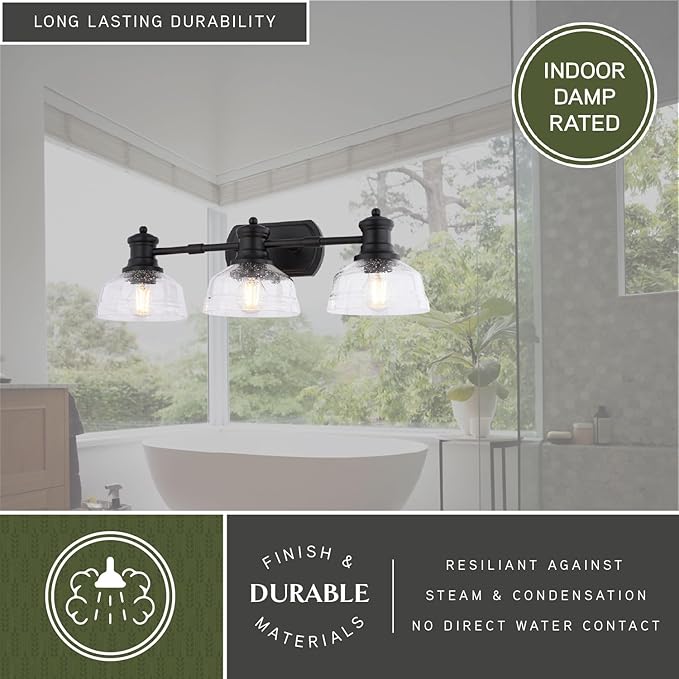 VAXCEL Beloit 3-Light 25.5 in. Wide Matte Black Farmhouse Bathroom Vanity Lighting Fixture, Clear Seeded Glass Shade, Dimmable, LED Compatible, Reversible Over The Mirror Mounted Steel Wall Sconce