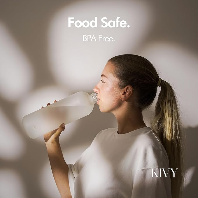 KIVY Large Water Bottle 50oz [Lightweight & Shatterproof] Fits Backpack & Cupholder for Travel, Sports, School - Extra large water bottle no straw - 1.5 Liter water bottles - 50oz Water bottle Yellow